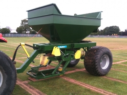 Shelton 6 tonne fast flow gravel and sand hopper in operation on playing field